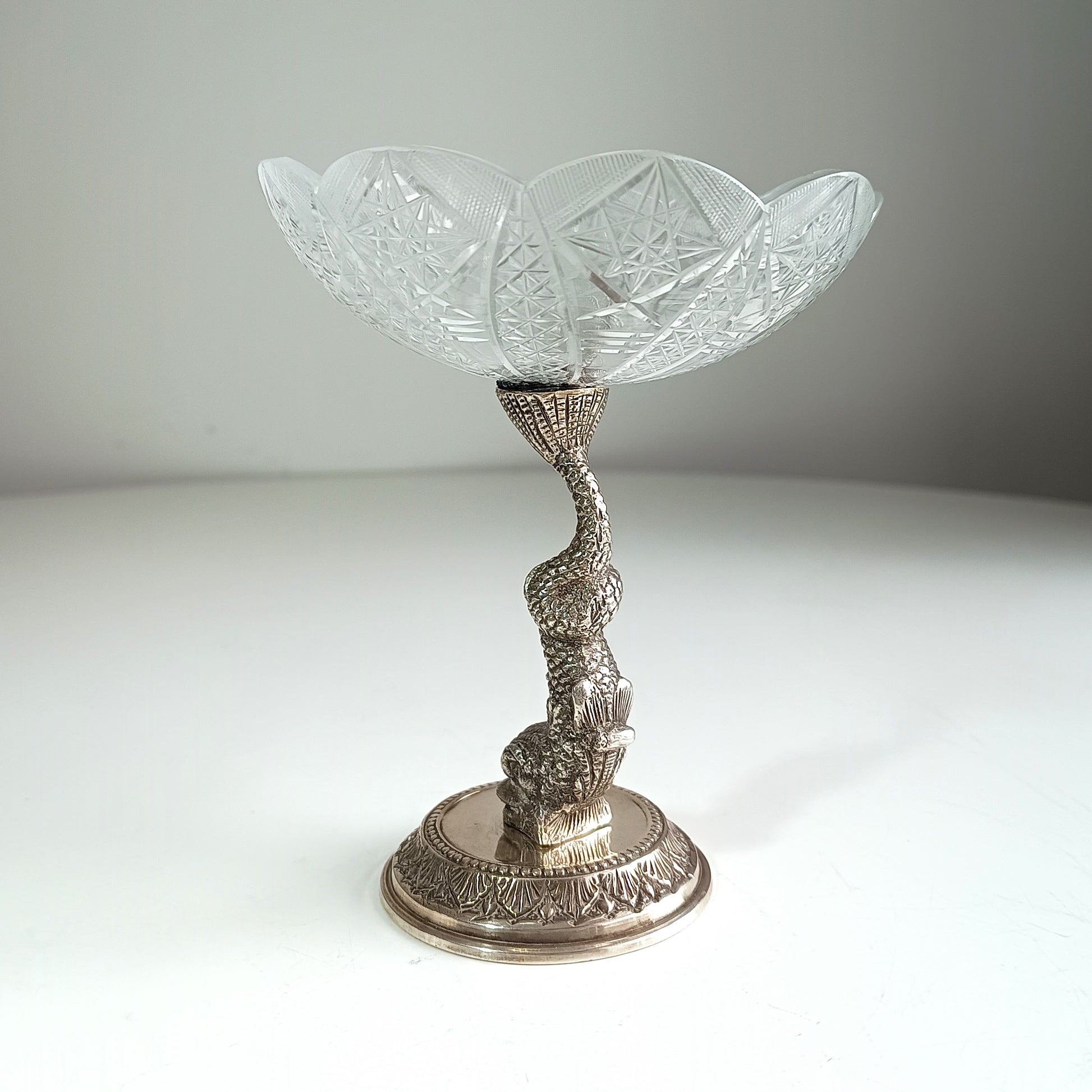 Antique silver dolphin