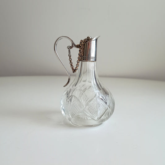 Cut gass cruet decanter with silver lid and chain