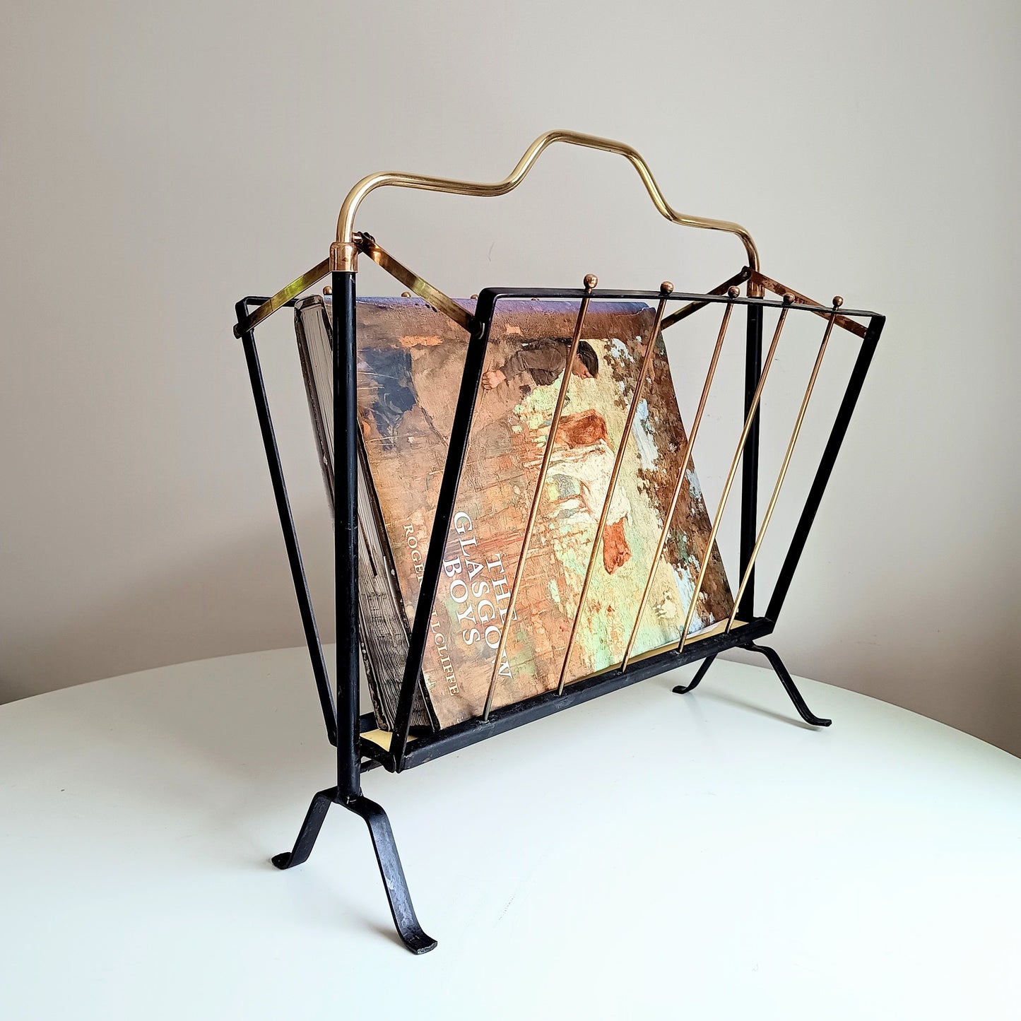 Authentic Vintage 1950s MCM Mid-Century Modern Brass Black Metal Magazine Rack in the style of Mathieu Matégot France or Cesare Lacca Italy