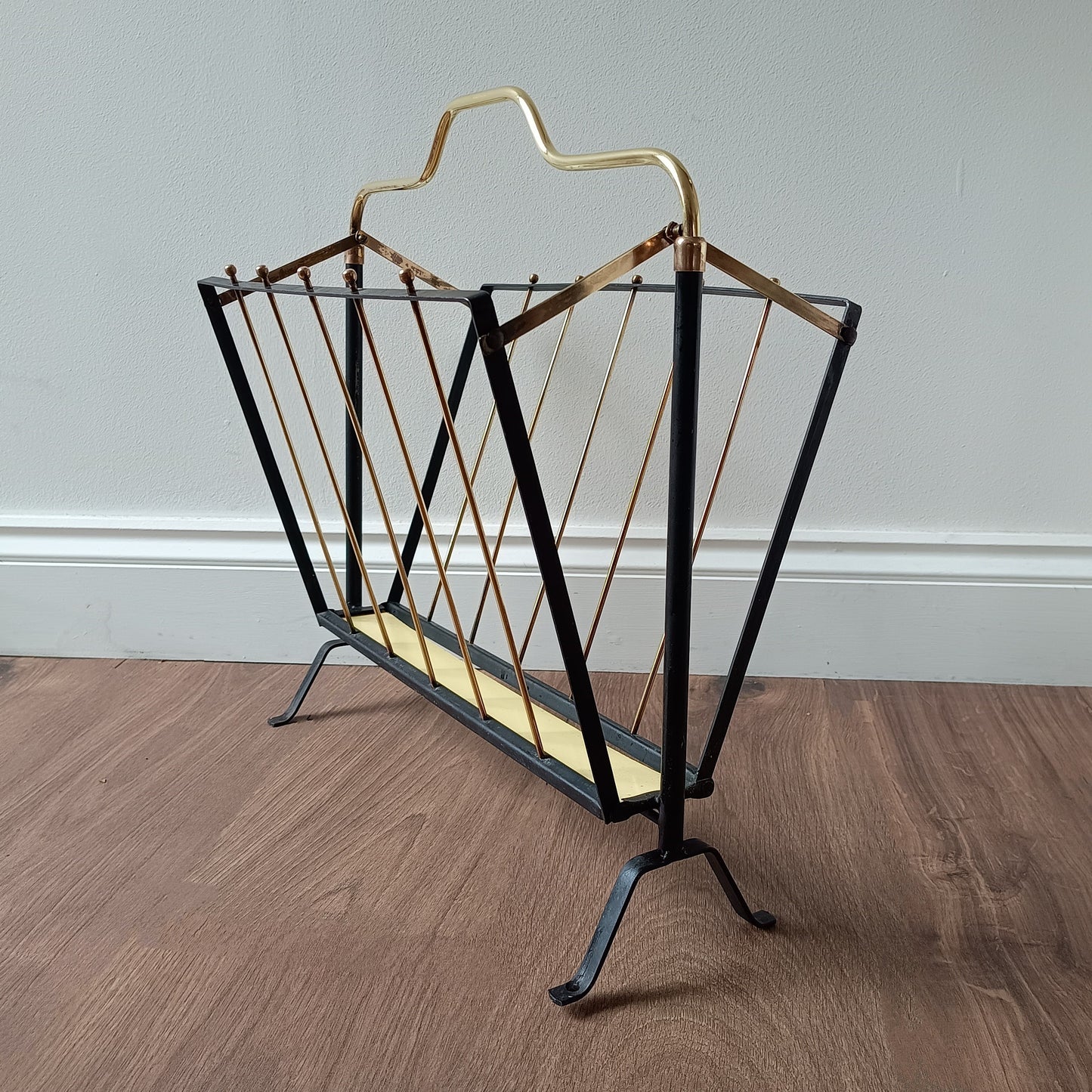 Authentic Vintage 1950s MCM Mid-Century Modern Brass Black Metal Magazine Rack in the style of Mathieu Matégot France or Cesare Lacca Italy