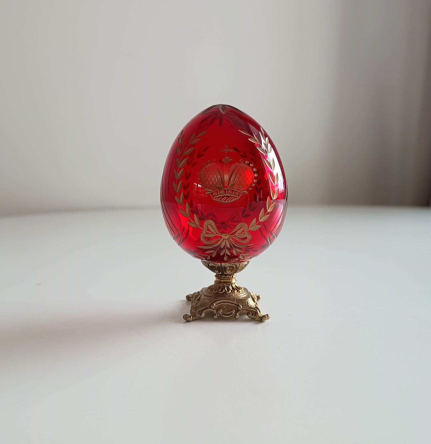 Vintage Ruby Glass Engraved Gilded Crystal Egg with Brass Mount in the style of Faberge, Desk / Shelf Styling Ornament