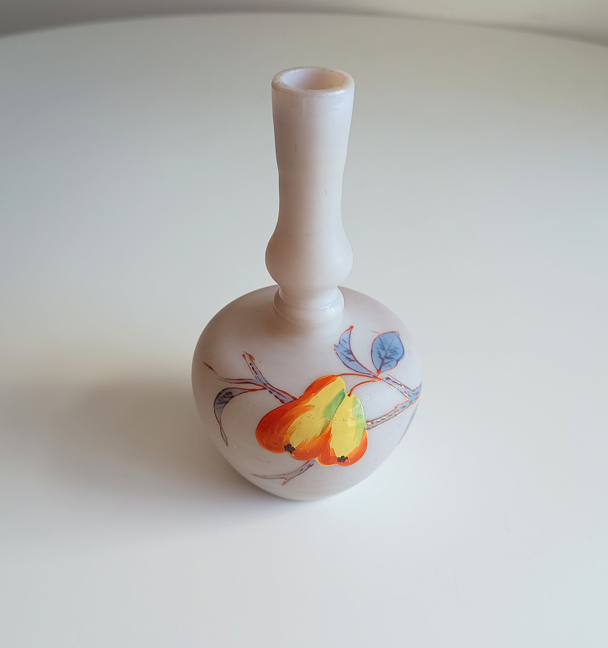 Art Nouveau coffee opaque soft glass vase has a bulbous Chinoiserie shape and a satin finish. It is hand-painted with early Art Nouveau style red and yellow flowers and grasses
