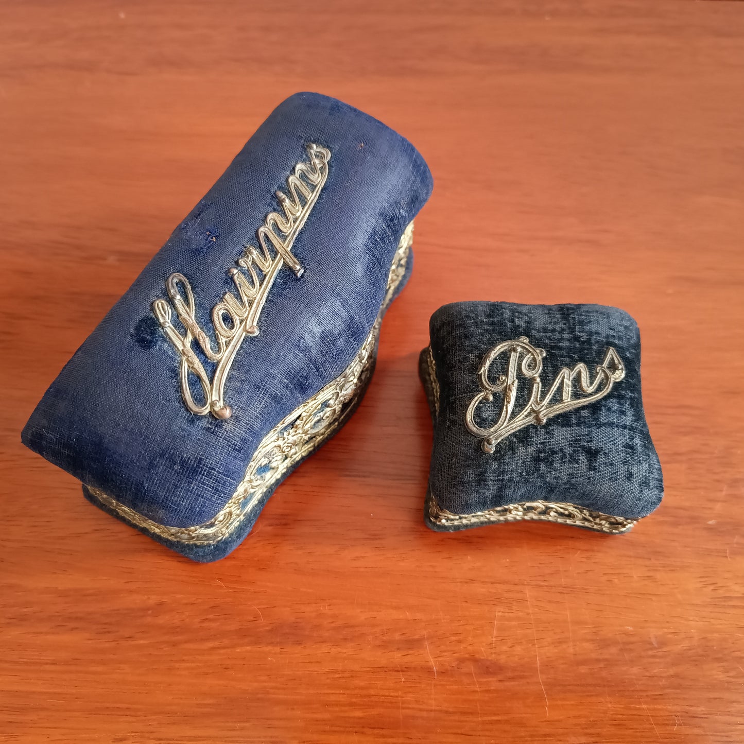 Two Antique Victorian Pin Cushions: Navy Velvet, Metal Lace Ornament, c 1890