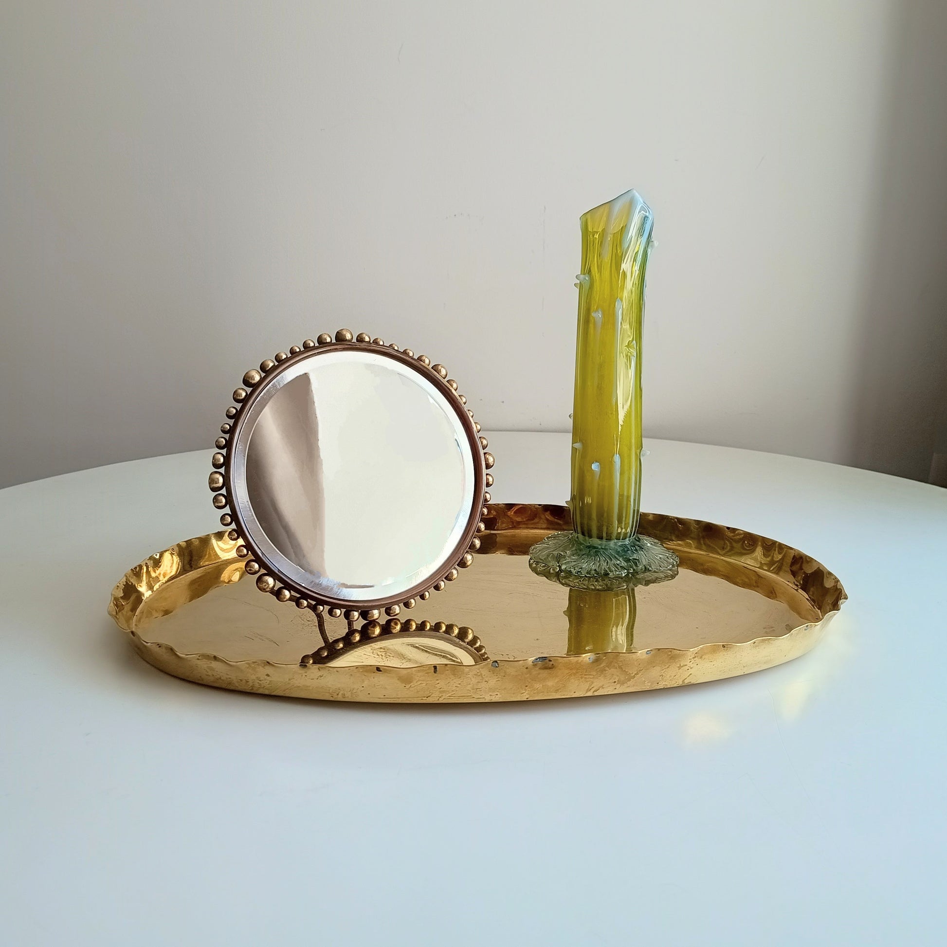 Arts and crafts tray with round beaded border mirror and tall green thorn vase