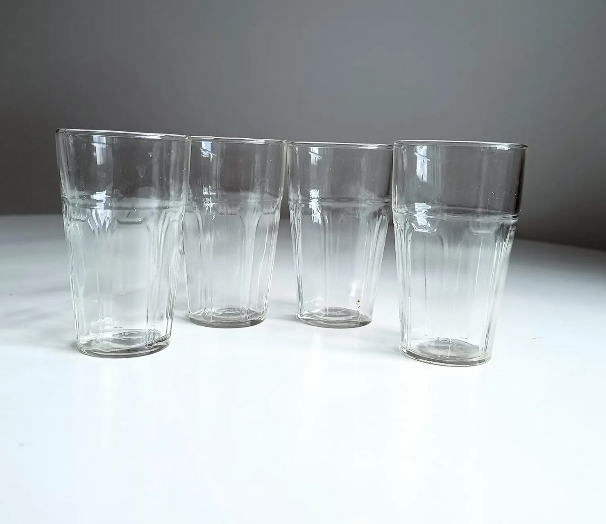 Antique or Vintage Early 20th Century Hand Made Set of Four Clear Art Nouveau Juice or Whisky Glasses Faint Pontil Mark Arch-style Pattern