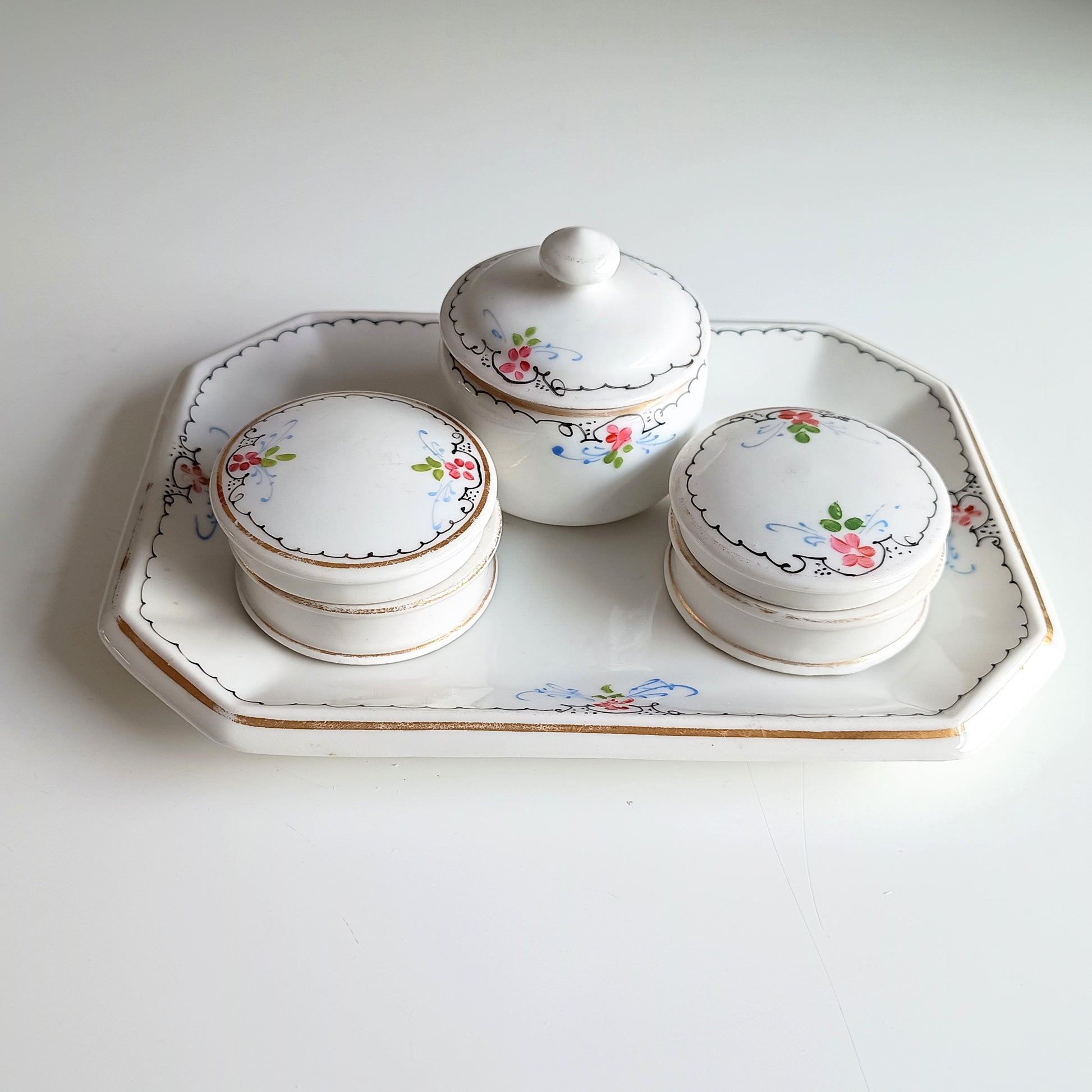 19th century French Porcelain Set of Hand-Painted Tray and 3 Lidded Pots
