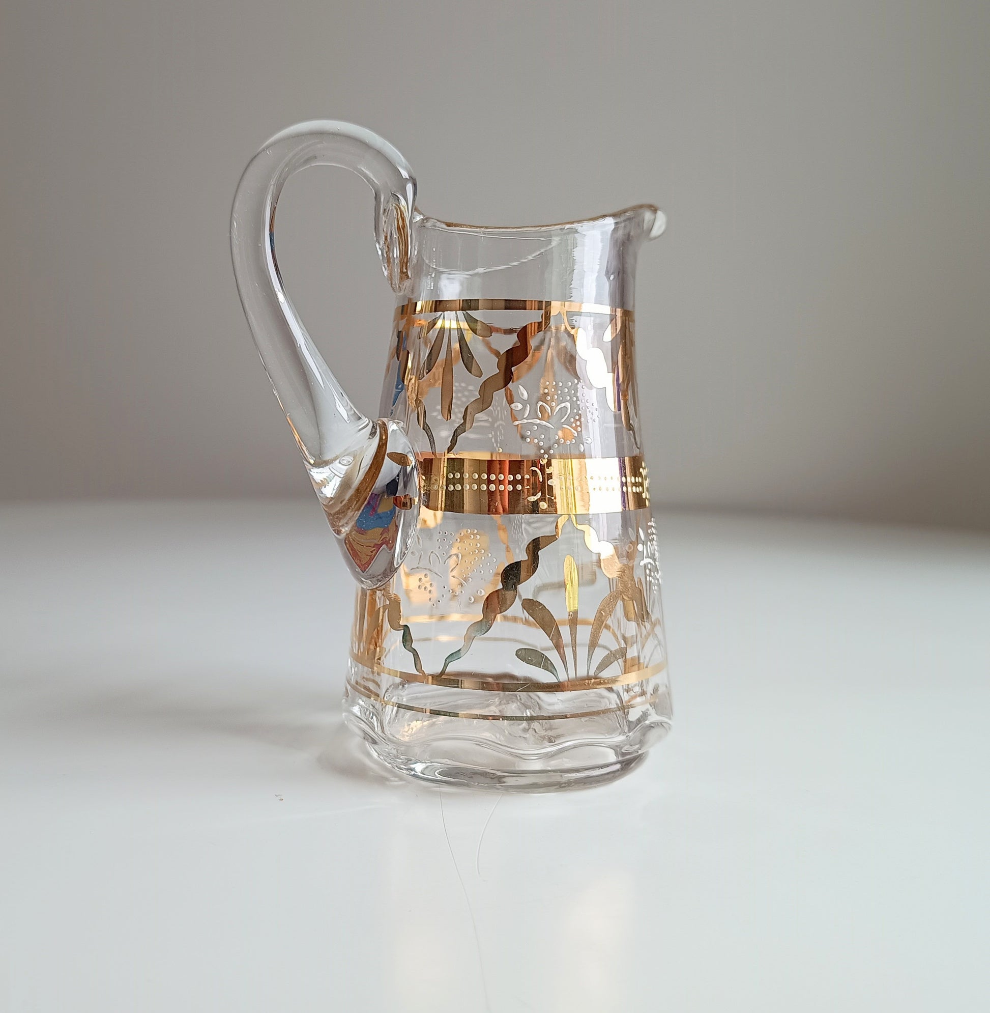 Small Edwardian English Hand Blown Art Glass Small Creamer Jug with Gilding early 20th century