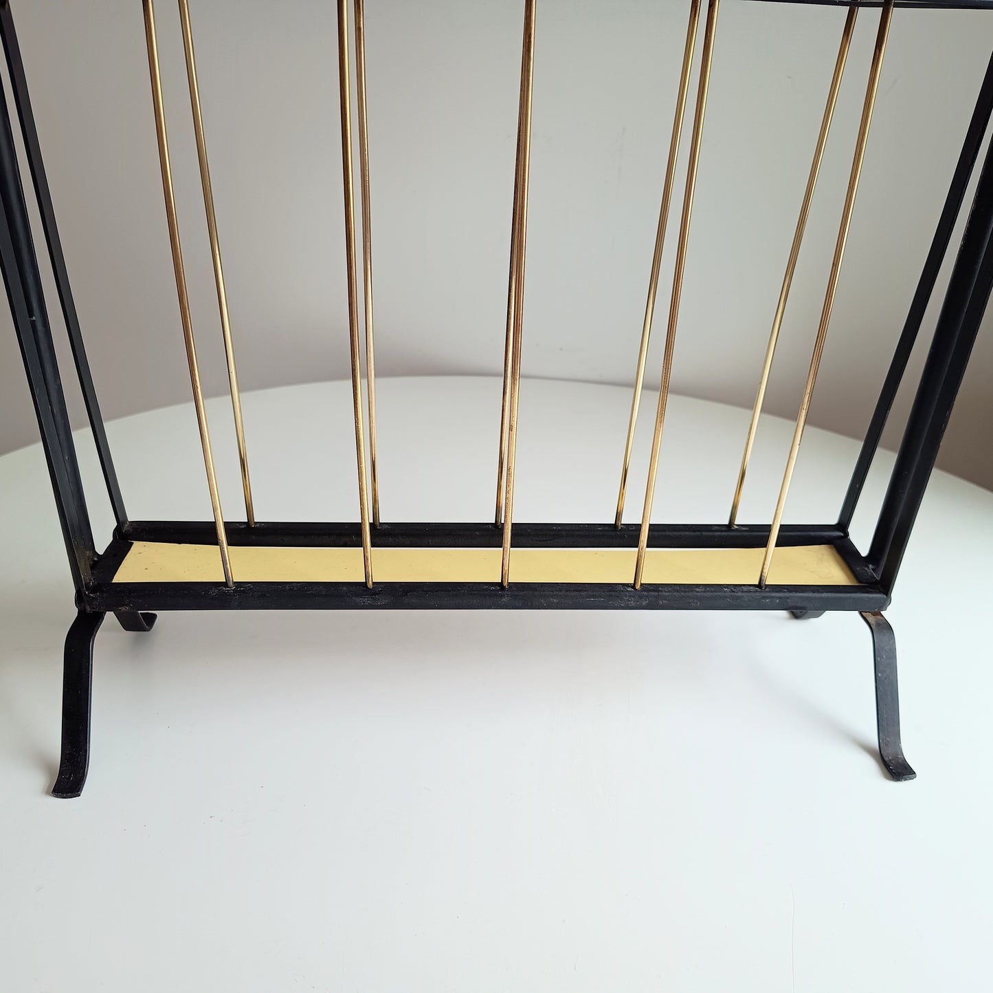 Authentic Vintage 1950s MCM Mid-Century Modern Brass Black Metal Magazine Rack in the style of Mathieu Matégot France or Cesare Lacca Italy