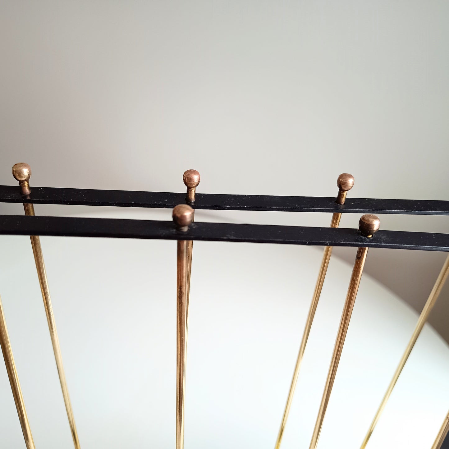 Authentic Vintage 1950s MCM Mid-Century Modern Brass Black Metal Magazine Rack in the style of Mathieu Matégot France or Cesare Lacca Italy