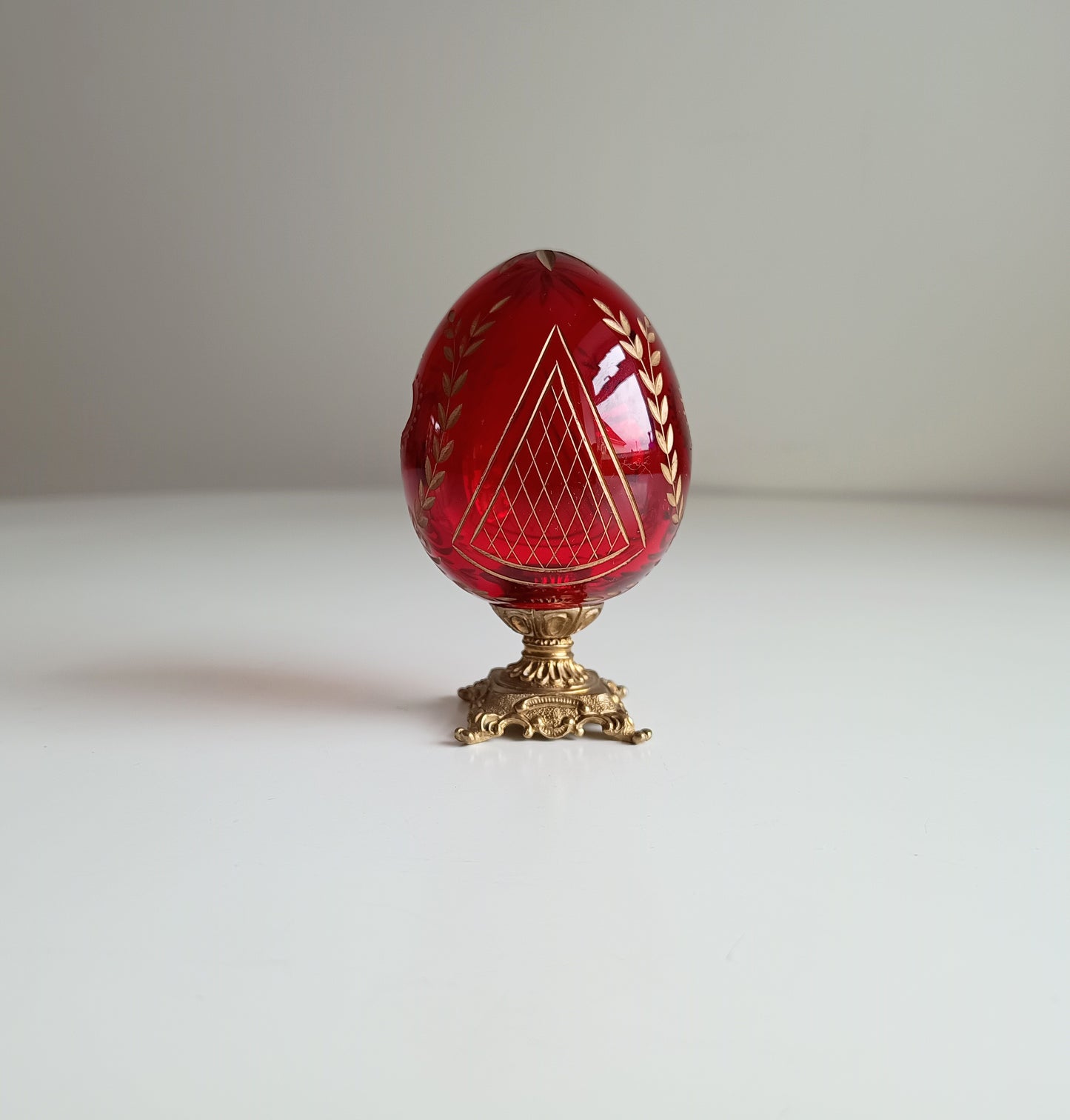 Vintage Ruby Glass Engraved Gilded Crystal Egg with Brass Mount in the style of Faberge, Desk / Shelf Styling Ornament