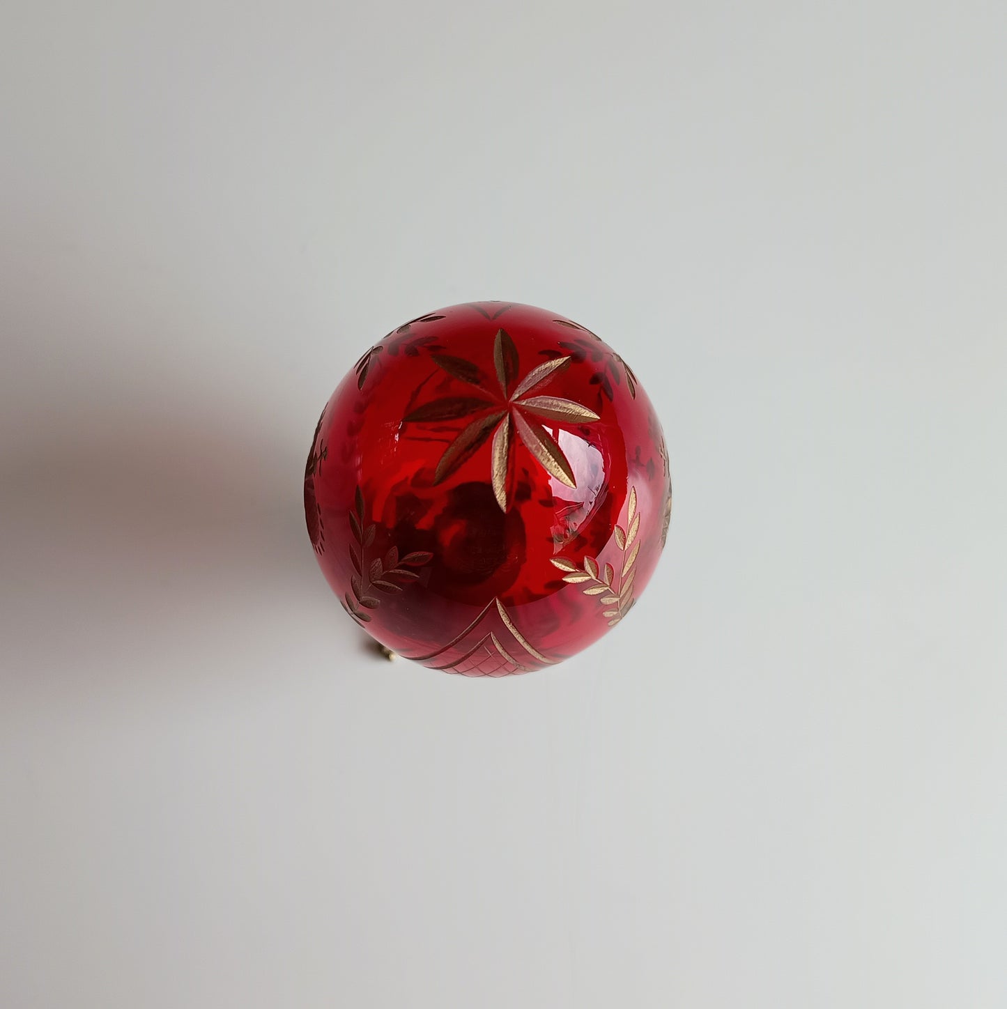 Vintage Ruby Glass Engraved Gilded Crystal Egg with Brass Mount in the style of Faberge, Desk / Shelf Styling Ornament