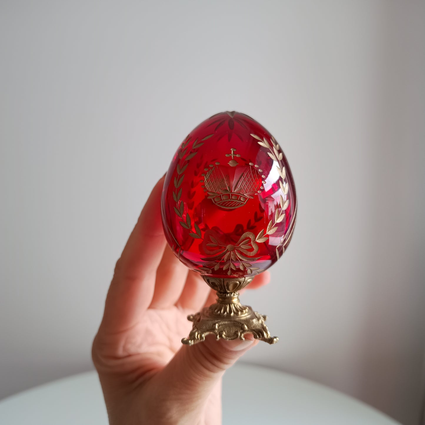 Vintage Ruby Glass Engraved Gilded Crystal Egg with Brass Mount in the style of Faberge, Desk / Shelf Styling Ornament