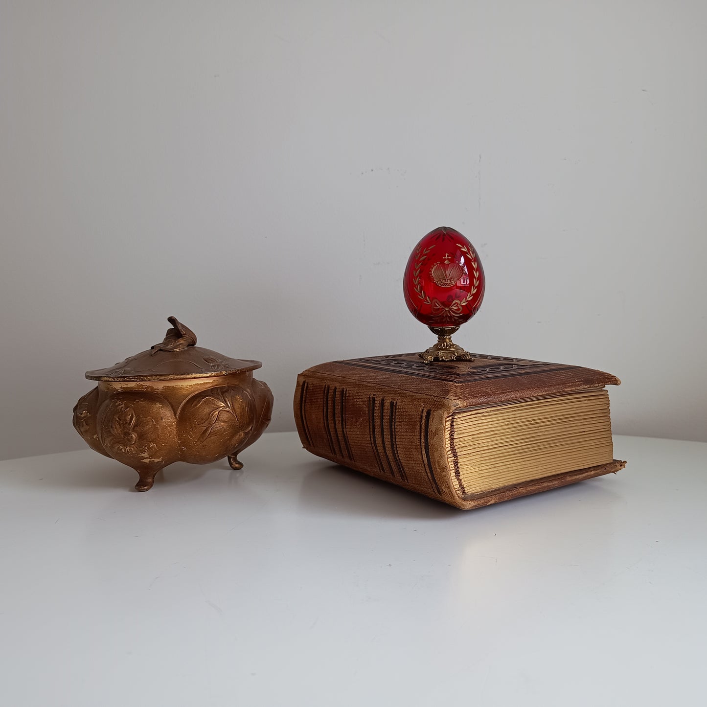 Vintage Ruby Glass Engraved Gilded Crystal Egg with Brass Mount in the style of Faberge, Desk / Shelf Styling Ornament