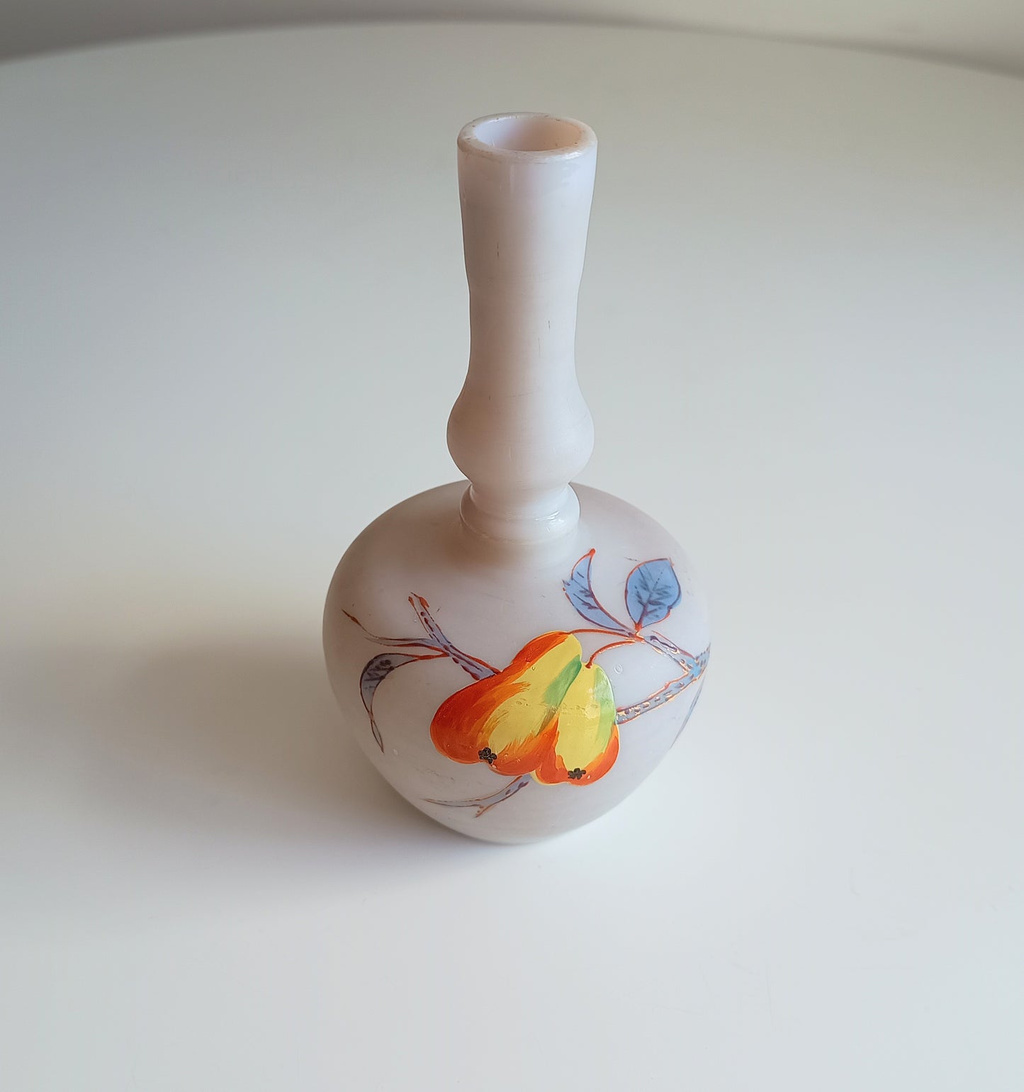 Art Nouveau coffee opaque soft glass vase has a bulbous Chinoiserie shape and a satin finish. It is hand-painted with early Art Nouveau style red and yellow flowers and grasses 
