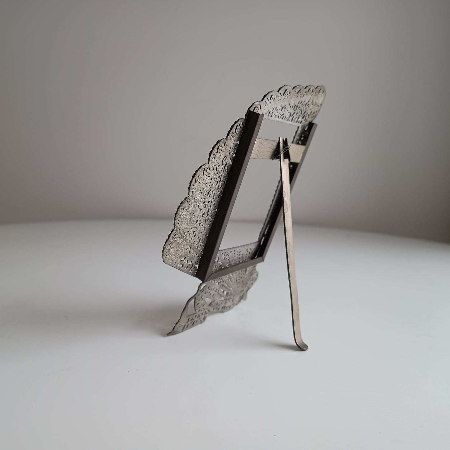 Antique Jugendstil Faux Filigree Curtain Shaped Tabletop Easel Stand Photo Frame Impressed Toleware c 1900 for Cabinet Portrait Photos