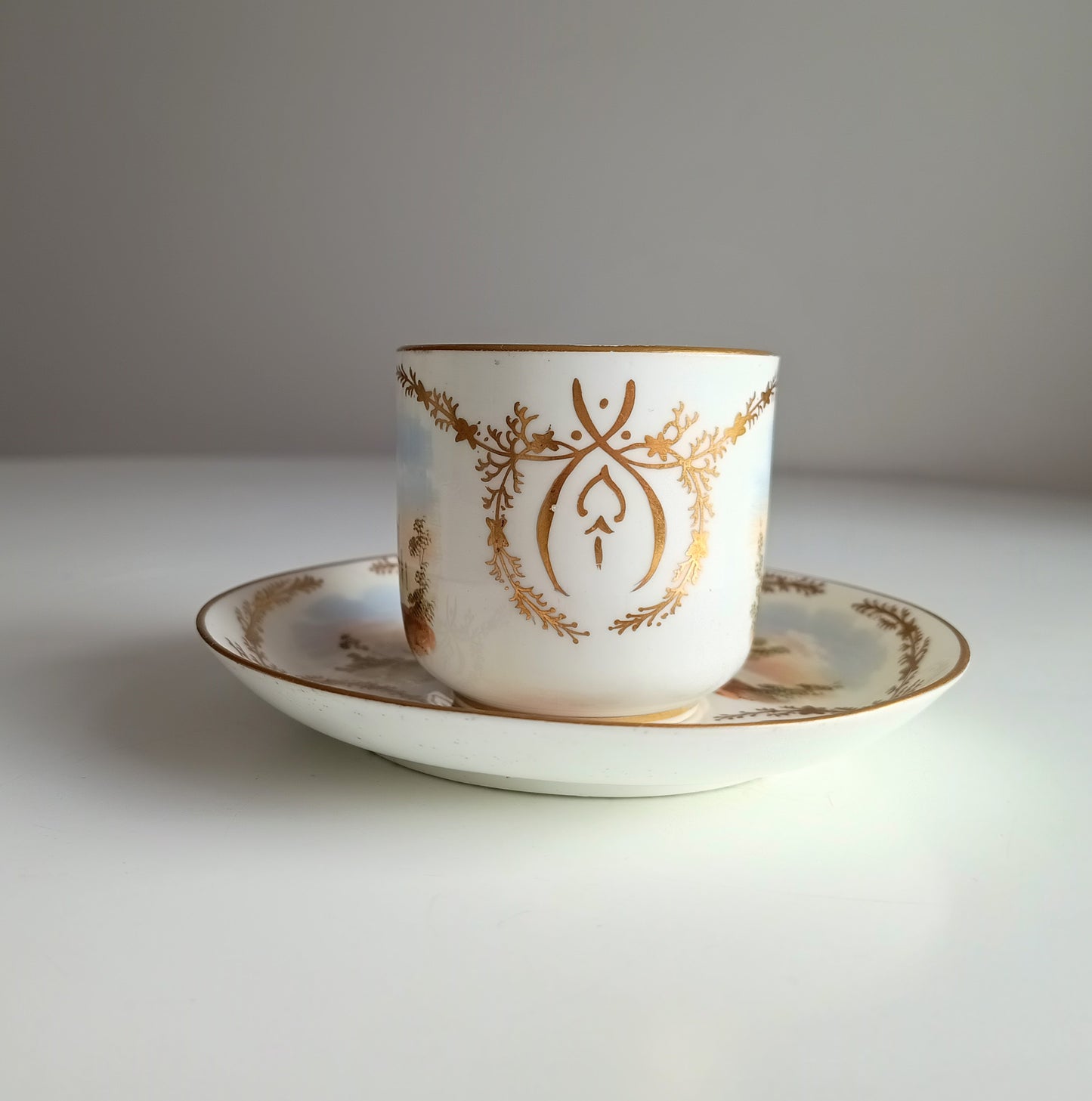 Antique Hand-Painted Landscape and Gilt Crests Porcelain Cup & Saucer, Austria 19th century