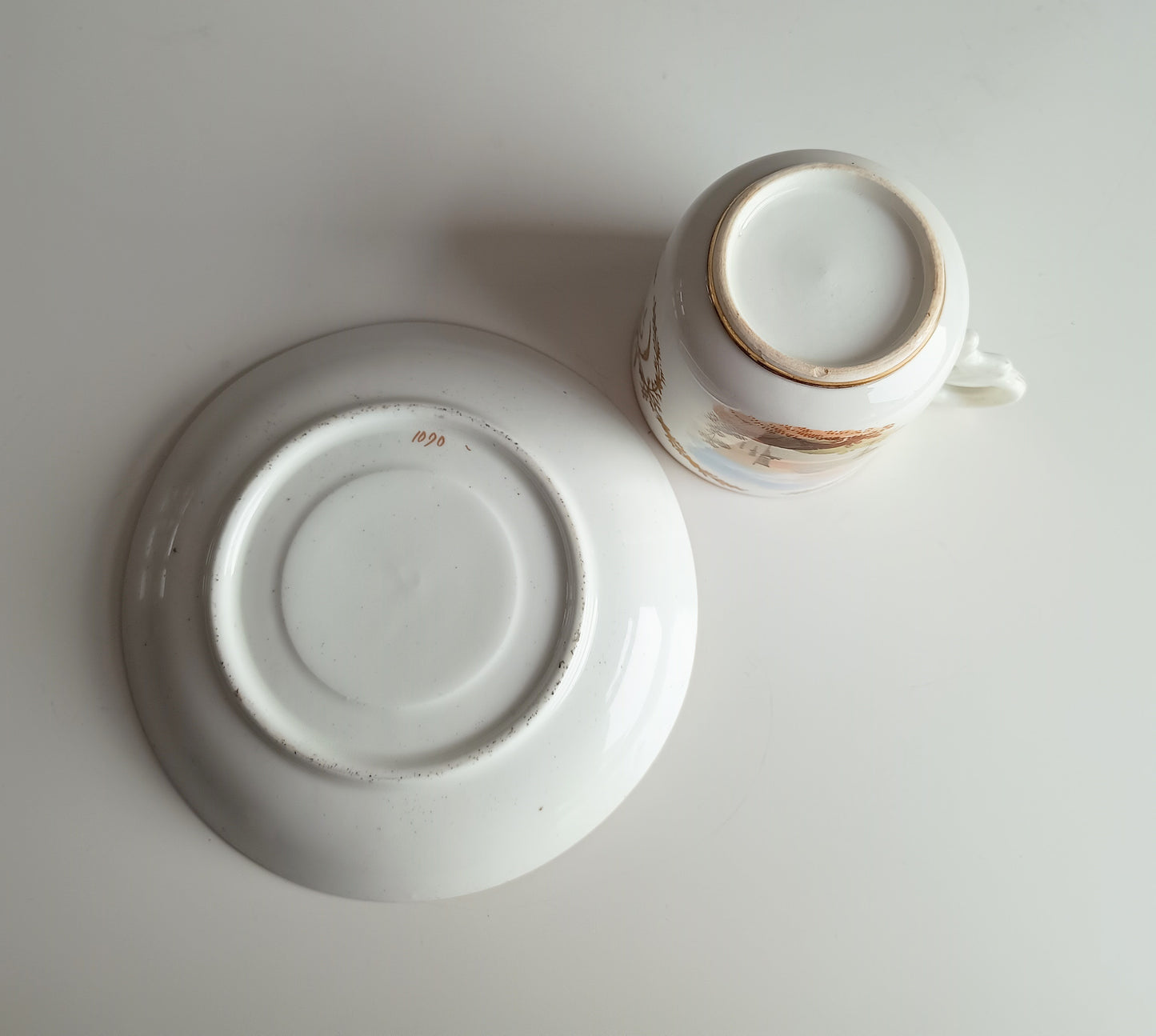 Antique Hand-Painted Landscape and Gilt Crests Porcelain Cup & Saucer, Austria 19th century