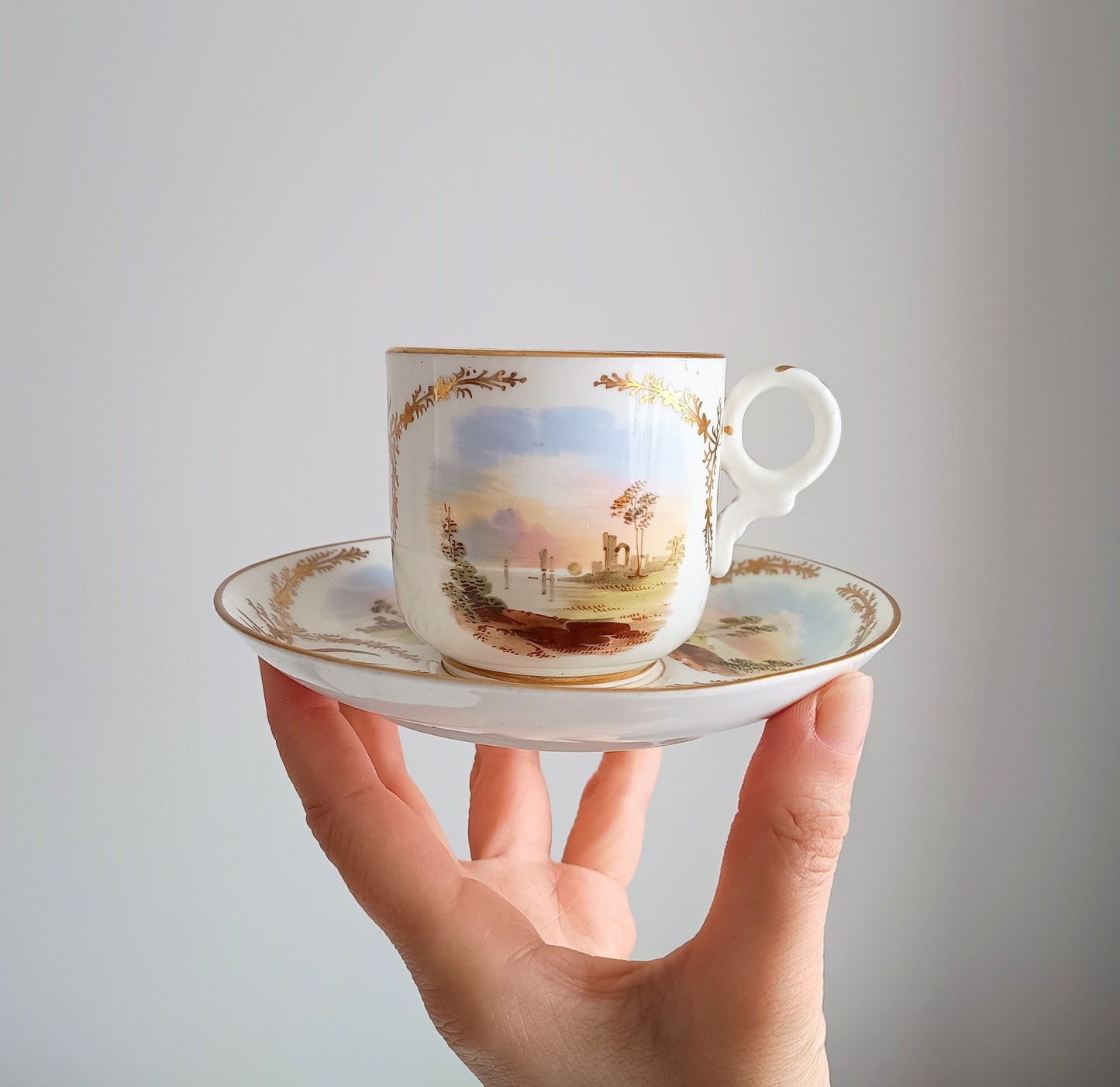 Antique Hand-Painted Landscape and Gilt Crests Porcelain Cup & Saucer, Austria 19th century