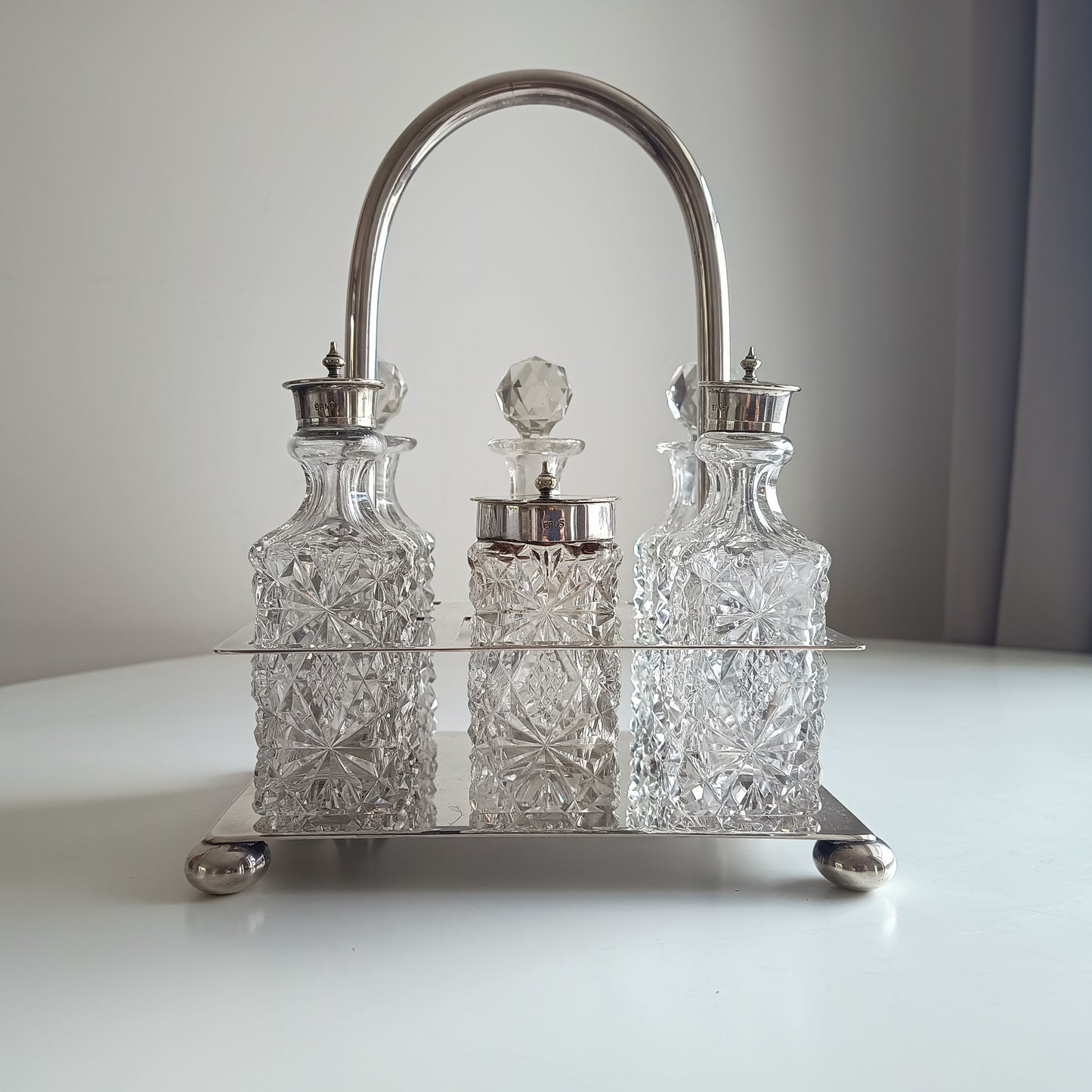 Victorian English Silver Plate Cruet Stand, Cut Glass Bottles Set: Briddon, Sheffield, 1880s