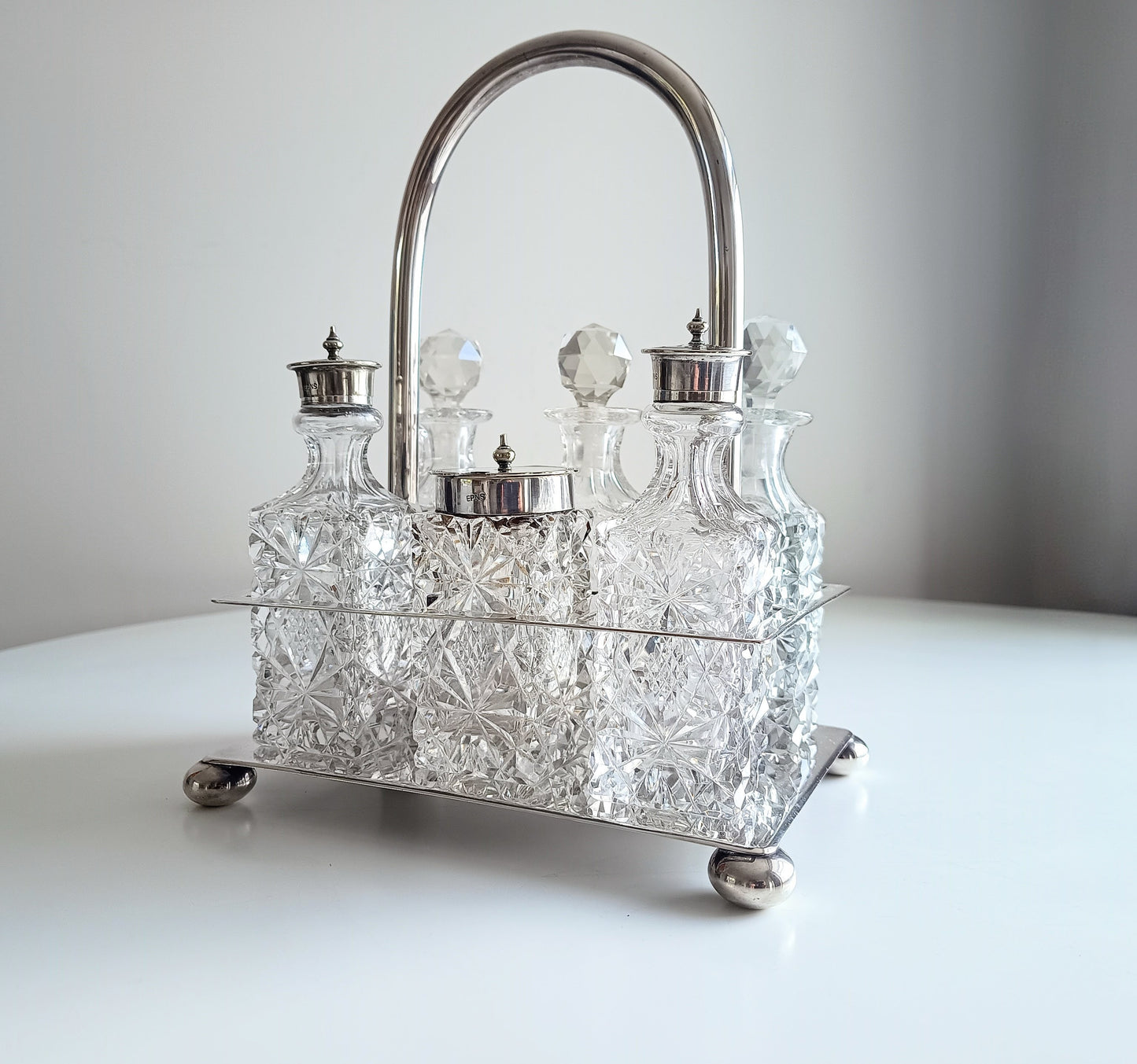 Victorian English Silver Plate Cruet Stand, Cut Glass Bottles Set: Briddon, Sheffield, 1880s
