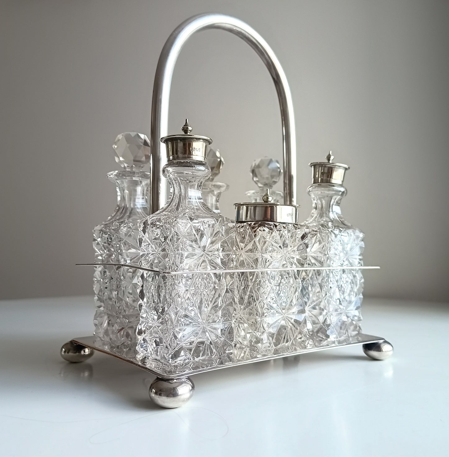 Victorian English Silver Plate Cruet Stand, Cut Glass Bottles Set: Briddon, Sheffield, 1880s