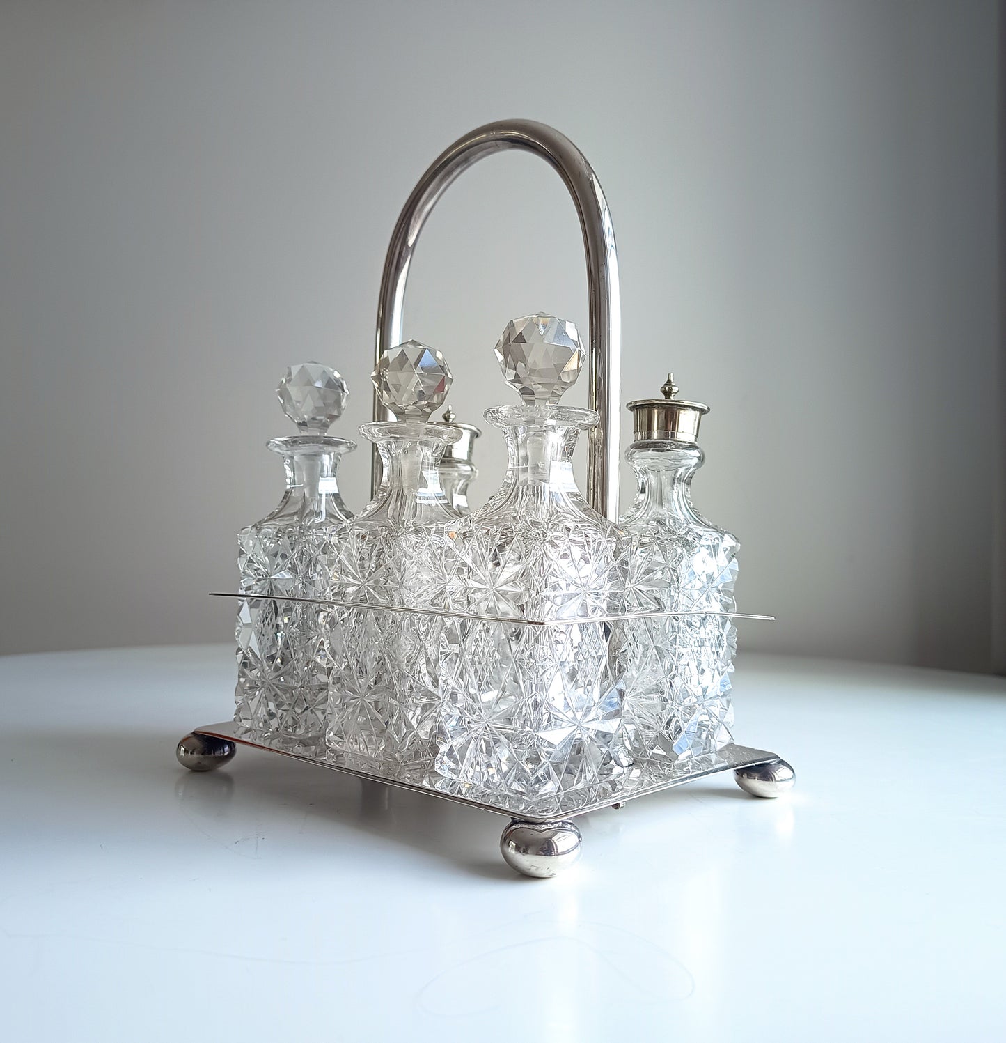 Victorian English Silver Plate Cruet Stand, Cut Glass Bottles Set: Briddon, Sheffield, 1880s