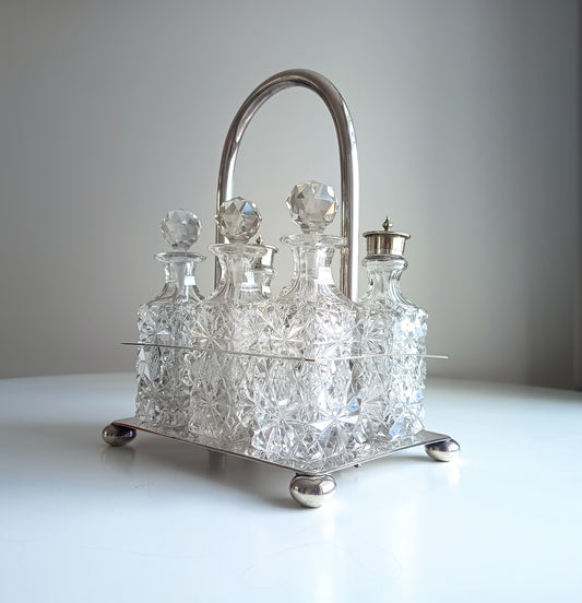 Victorian English Silver Plate Cruet Stand, Cut Glass Bottles Set: Briddon, Sheffield, 1880s