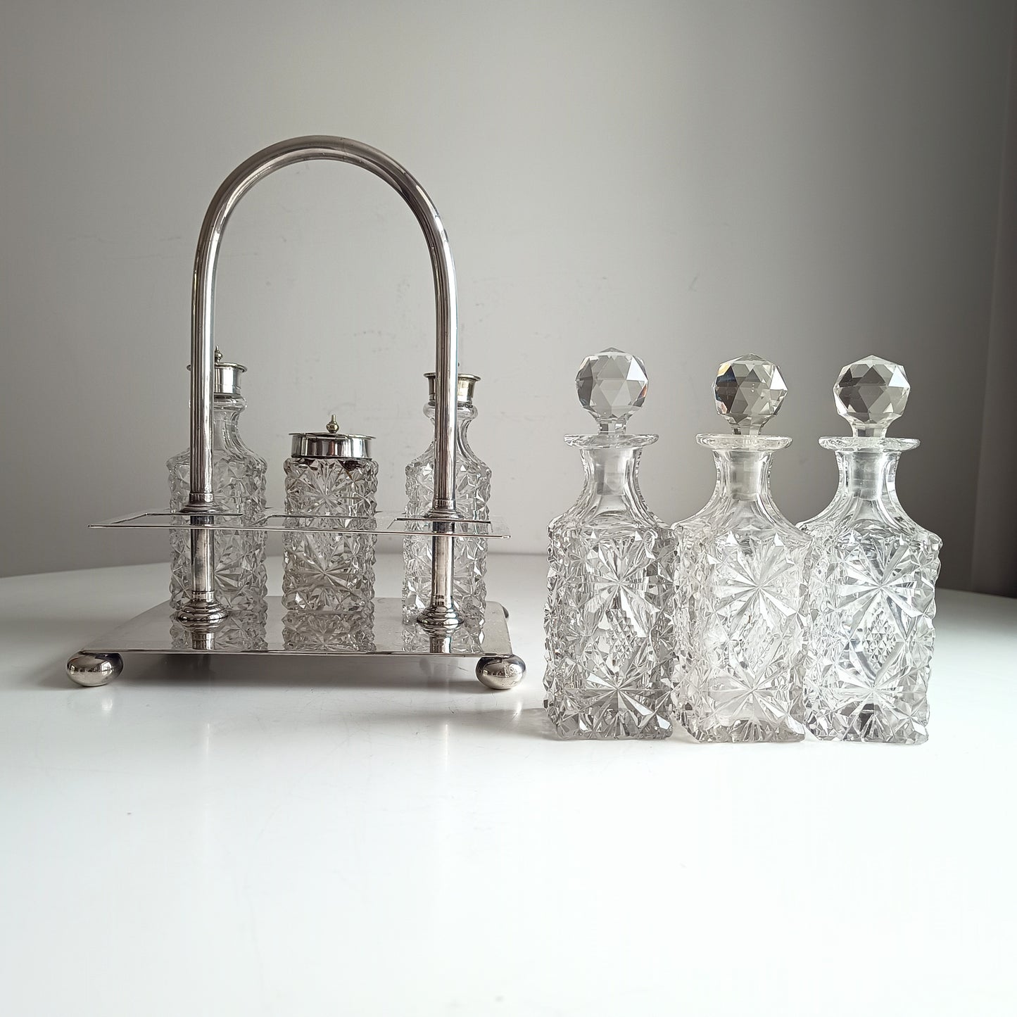 Victorian English Silver Plate Cruet Stand, Cut Glass Bottles Set: Briddon, Sheffield, 1880s
