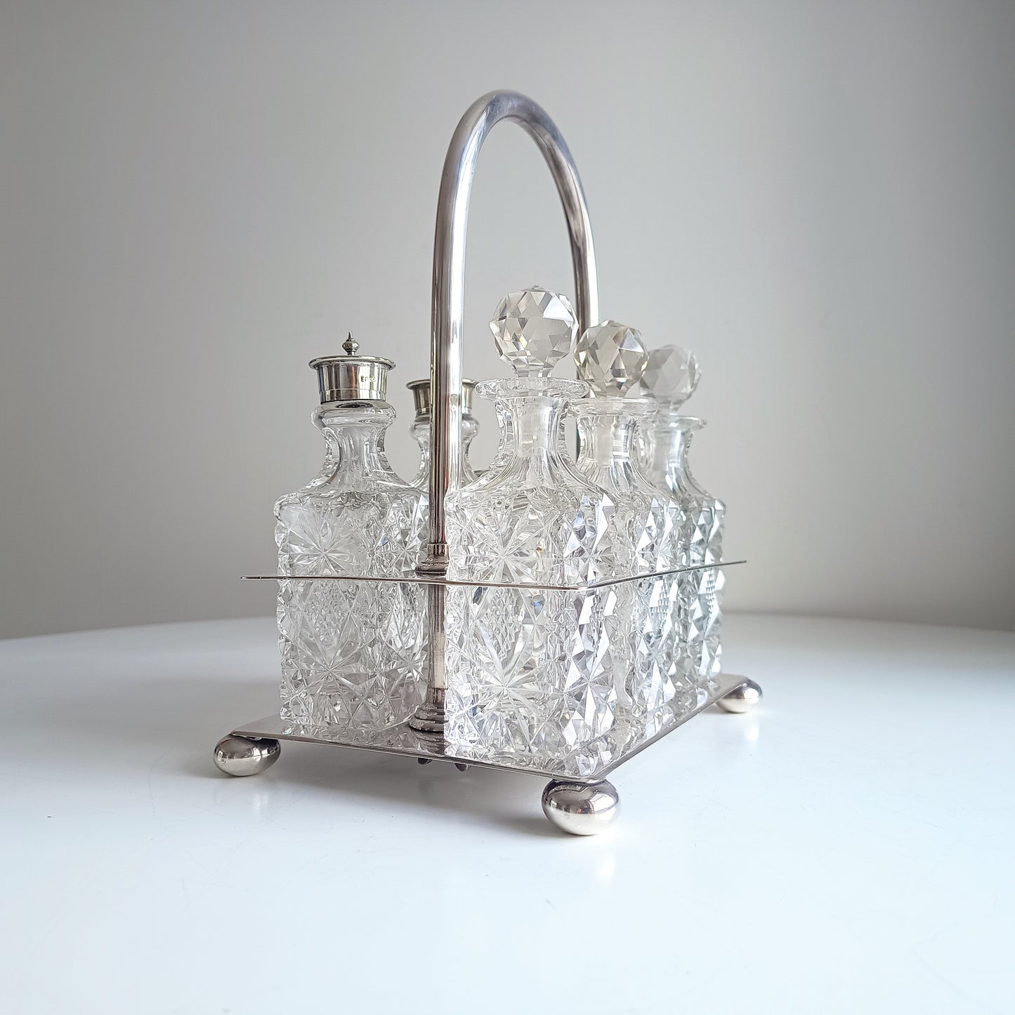 Victorian English Silver Plate Cruet Stand, Cut Glass Bottles Set: Briddon, Sheffield, 1880s