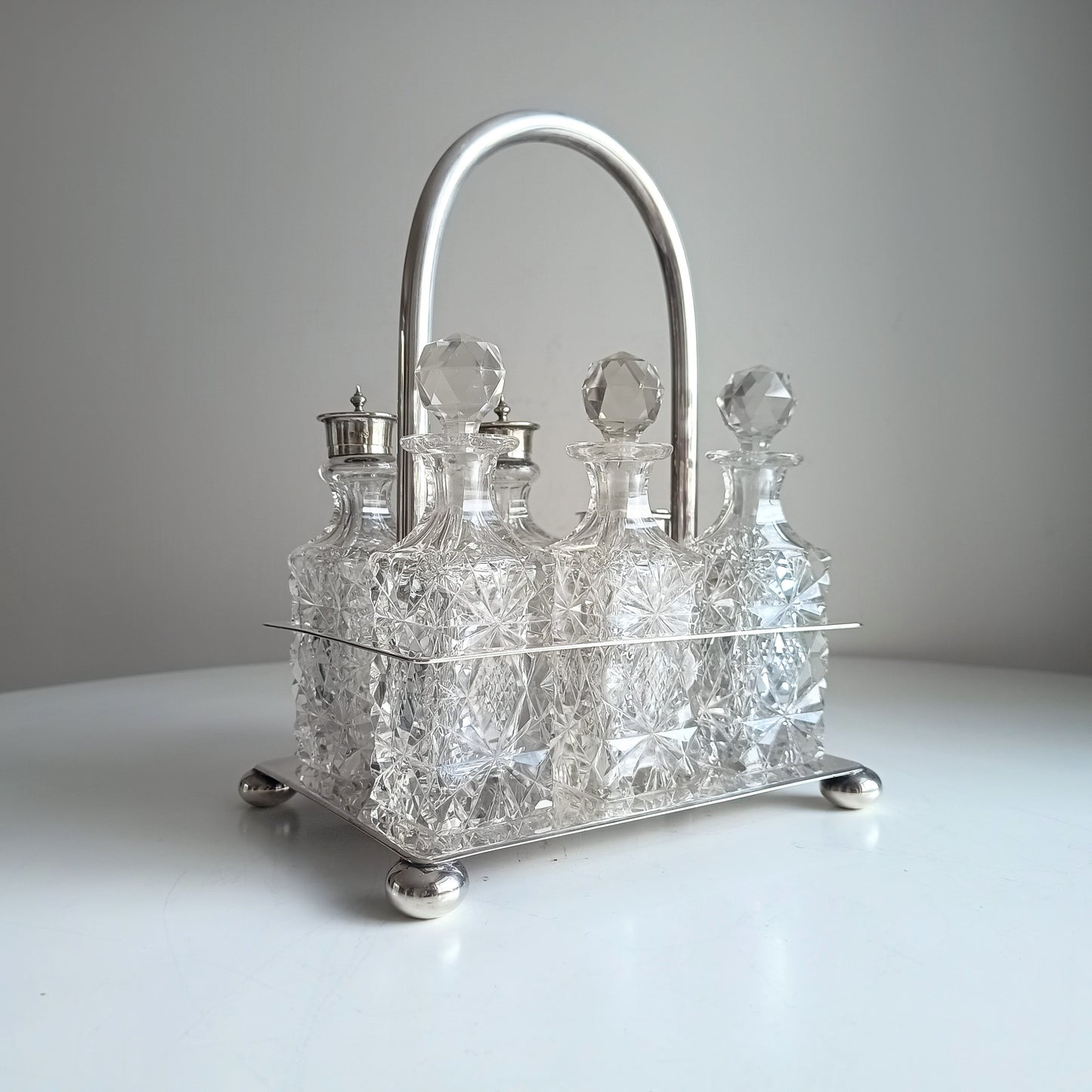 Victorian English Silver Plate Cruet Stand, Cut Glass Bottles Set: Briddon, Sheffield, 1880s
