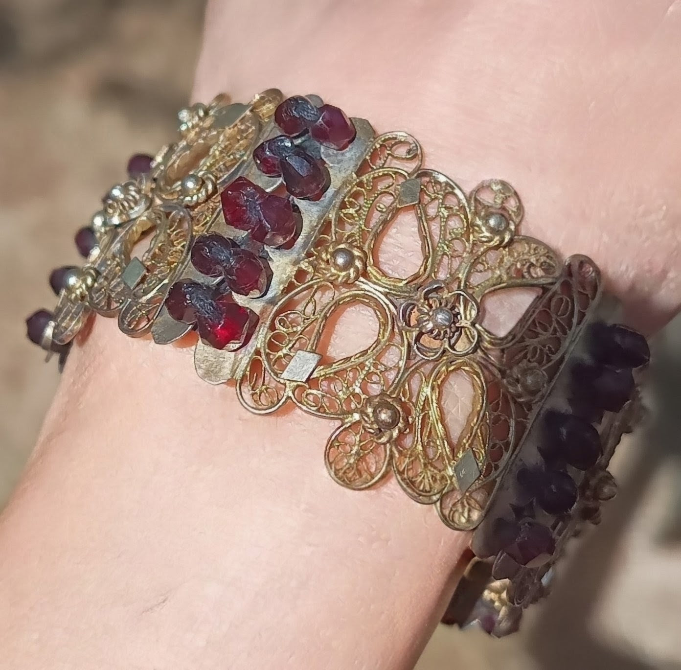 Antique 19thc Swiss Nidwalden Silver Filigree Pyrope Garnet Halbatti Bracelet: Alpine Folk ArtAuthentic 19th-century Swiss "Halbatti" panel bracelet from the Canton of Nidwalden. 

A rare example of regional alpine Trachtenschmuck (traditional folk costum