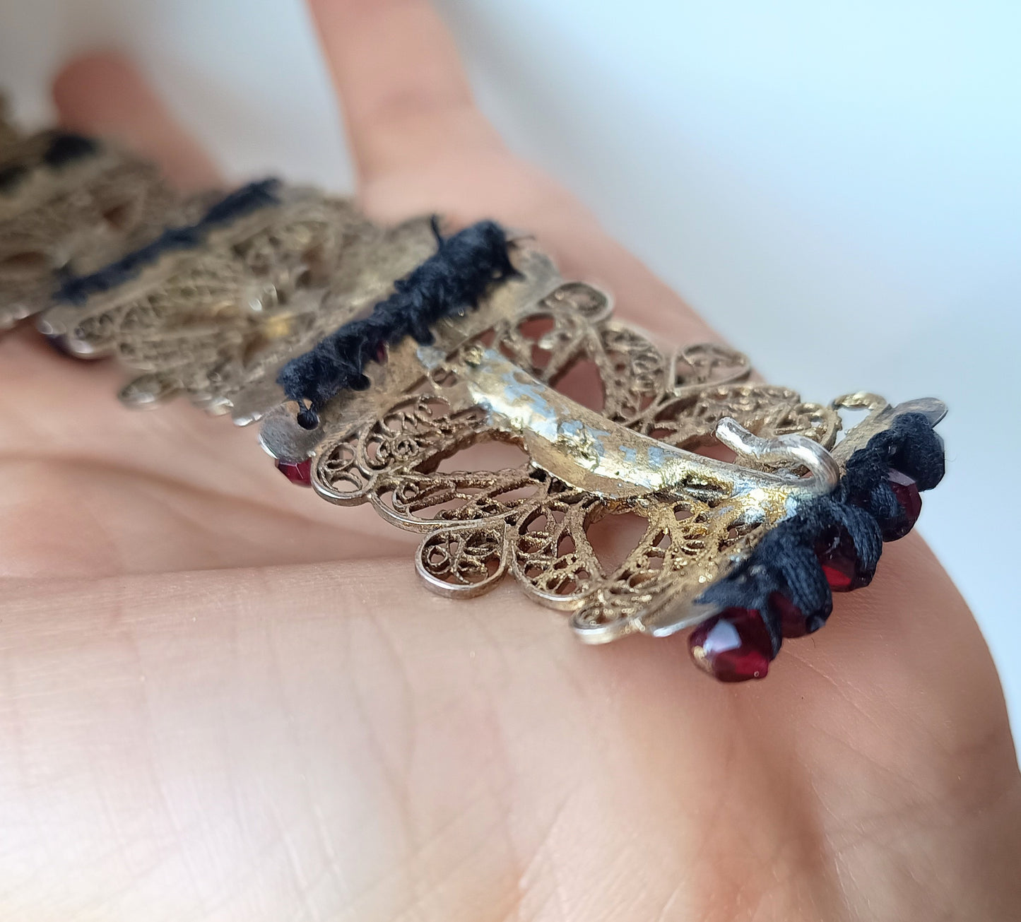 Antique 19thc Swiss Nidwalden Silver Filigree Pyrope Garnet Halbatti Bracelet: Alpine Folk ArtAuthentic 19th-century Swiss "Halbatti" panel bracelet from the Canton of Nidwalden. 

A rare example of regional alpine Trachtenschmuck (traditional folk costum