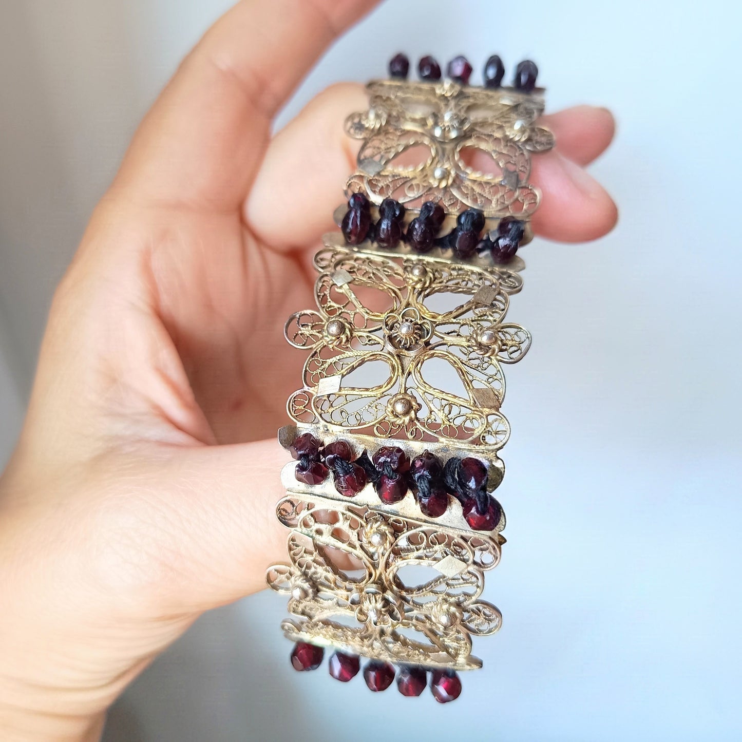 Antique 19thc Swiss Nidwalden Silver Filigree Pyrope Garnet Halbatti Bracelet: Alpine Folk ArtAuthentic 19th-century Swiss "Halbatti" panel bracelet from the Canton of Nidwalden. 

A rare example of regional alpine Trachtenschmuck (traditional folk costum