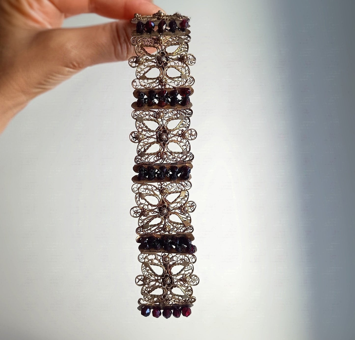 Antique 19thc Swiss Nidwalden Silver Filigree Pyrope Garnet Halbatti Bracelet: Alpine Folk ArtAuthentic 19th-century Swiss "Halbatti" panel bracelet from the Canton of Nidwalden. 

A rare example of regional alpine Trachtenschmuck (traditional folk costum