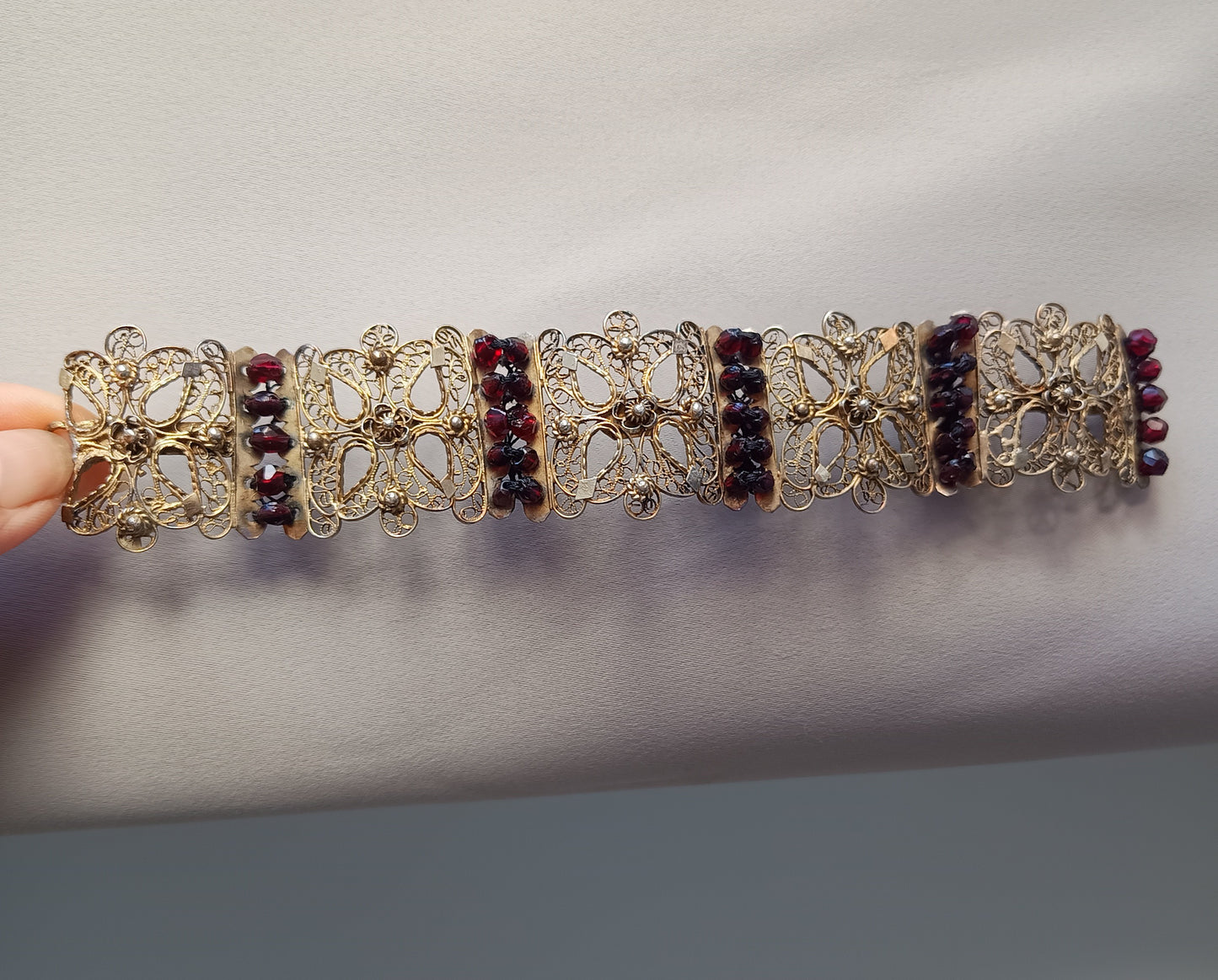Antique 19thc Swiss Nidwalden Silver Filigree Pyrope Garnet Halbatti Bracelet: Alpine Folk ArtAuthentic 19th-century Swiss "Halbatti" panel bracelet from the Canton of Nidwalden. 

A rare example of regional alpine Trachtenschmuck (traditional folk costum