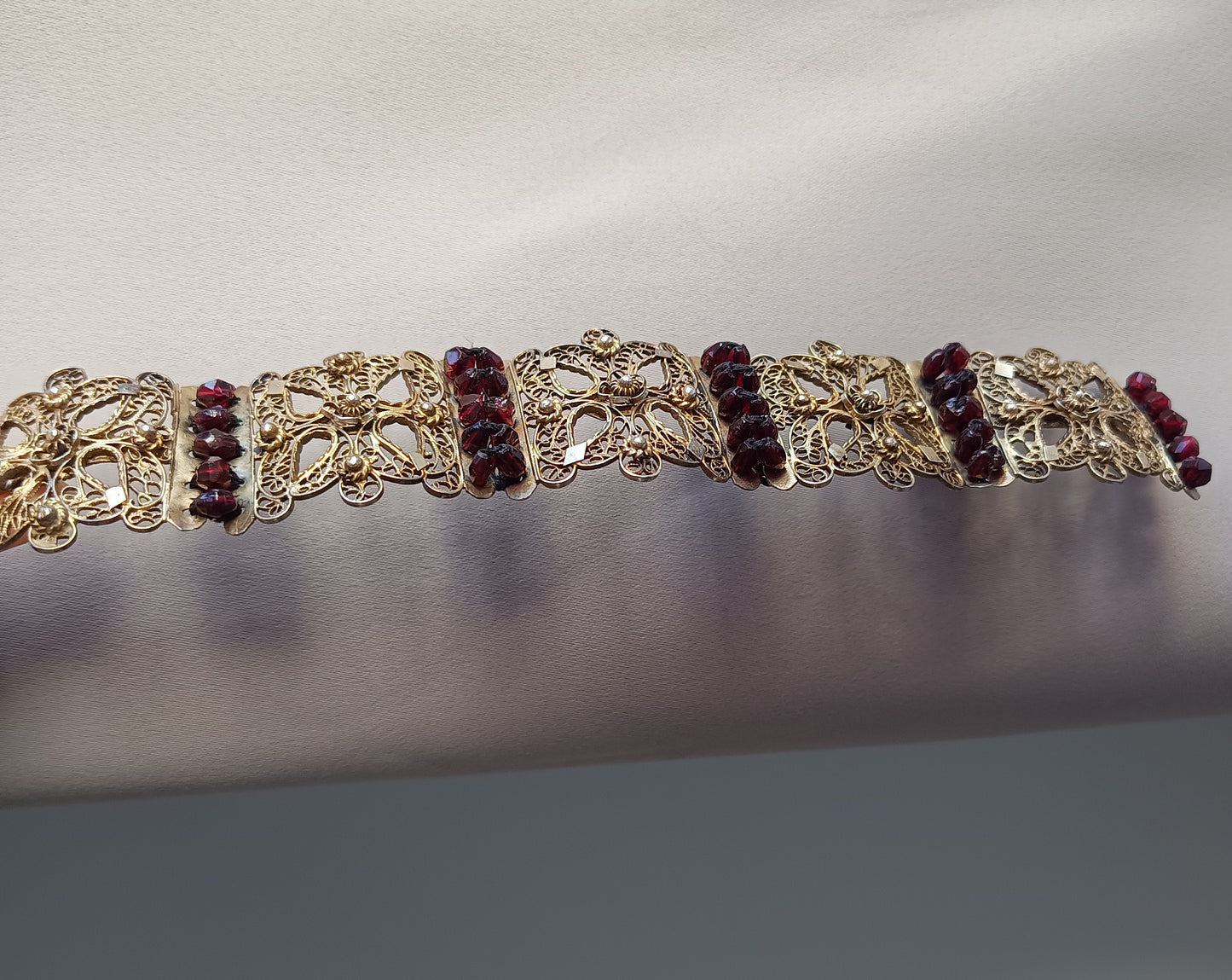 Antique 19thc Swiss Nidwalden Silver Filigree Pyrope Garnet Halbatti Bracelet: Alpine Folk ArtAuthentic 19th-century Swiss "Halbatti" panel bracelet from the Canton of Nidwalden. 

A rare example of regional alpine Trachtenschmuck (traditional folk costum