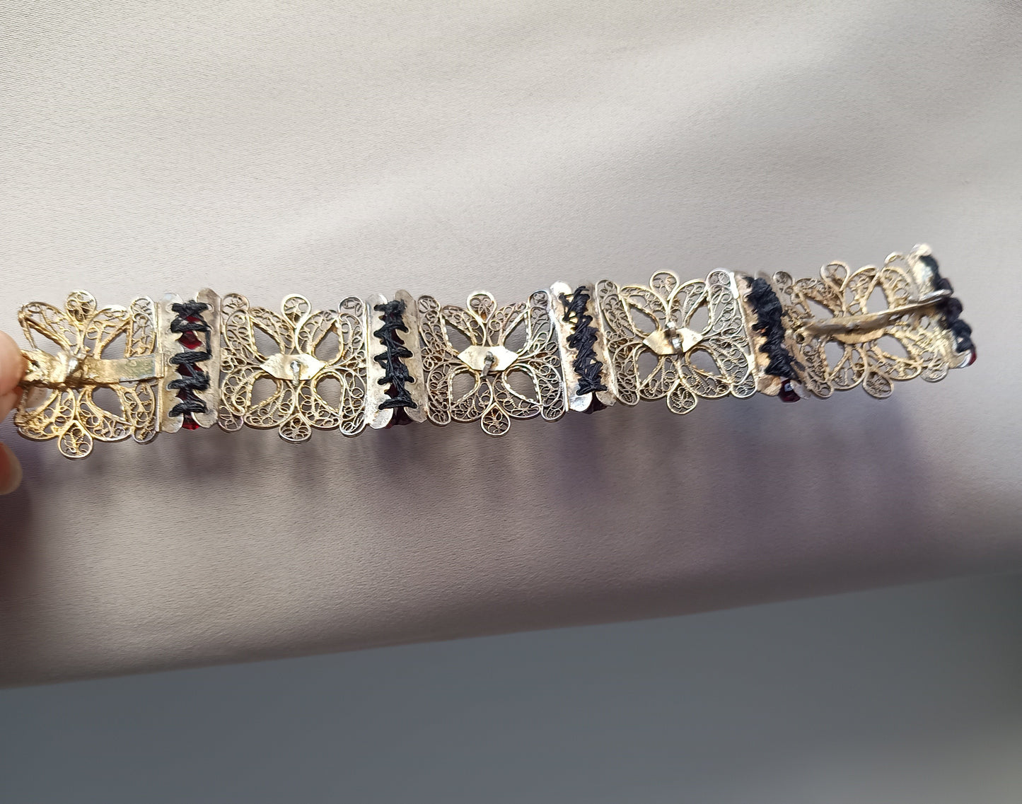 Antique 19thc Swiss Nidwalden Silver Filigree Pyrope Garnet Halbatti Bracelet: Alpine Folk ArtAuthentic 19th-century Swiss "Halbatti" panel bracelet from the Canton of Nidwalden. 

A rare example of regional alpine Trachtenschmuck (traditional folk costum