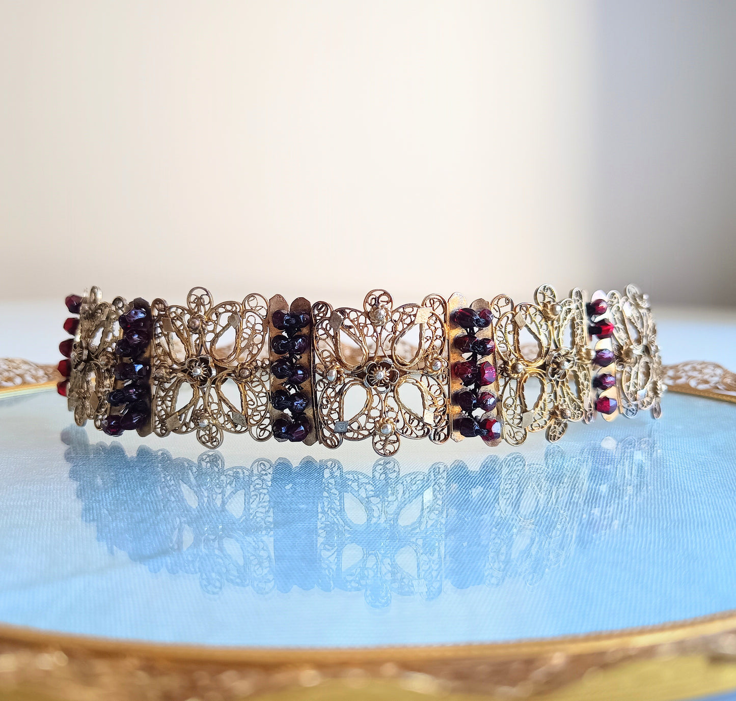 Antique 19thc Swiss Nidwalden Silver Filigree Pyrope Garnet Halbatti Bracelet: Alpine Folk ArtAuthentic 19th-century Swiss "Halbatti" panel bracelet from the Canton of Nidwalden. 

A rare example of regional alpine Trachtenschmuck (traditional folk costum