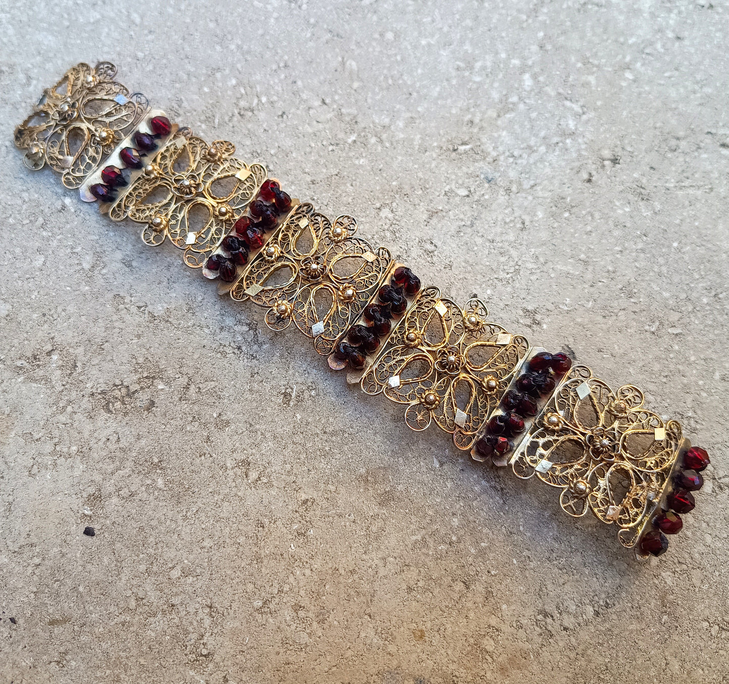 Antique 19thc Swiss Nidwalden Silver Filigree Pyrope Garnet Halbatti Bracelet: Alpine Folk ArtAuthentic 19th-century Swiss "Halbatti" panel bracelet from the Canton of Nidwalden. 

A rare example of regional alpine Trachtenschmuck (traditional folk costum