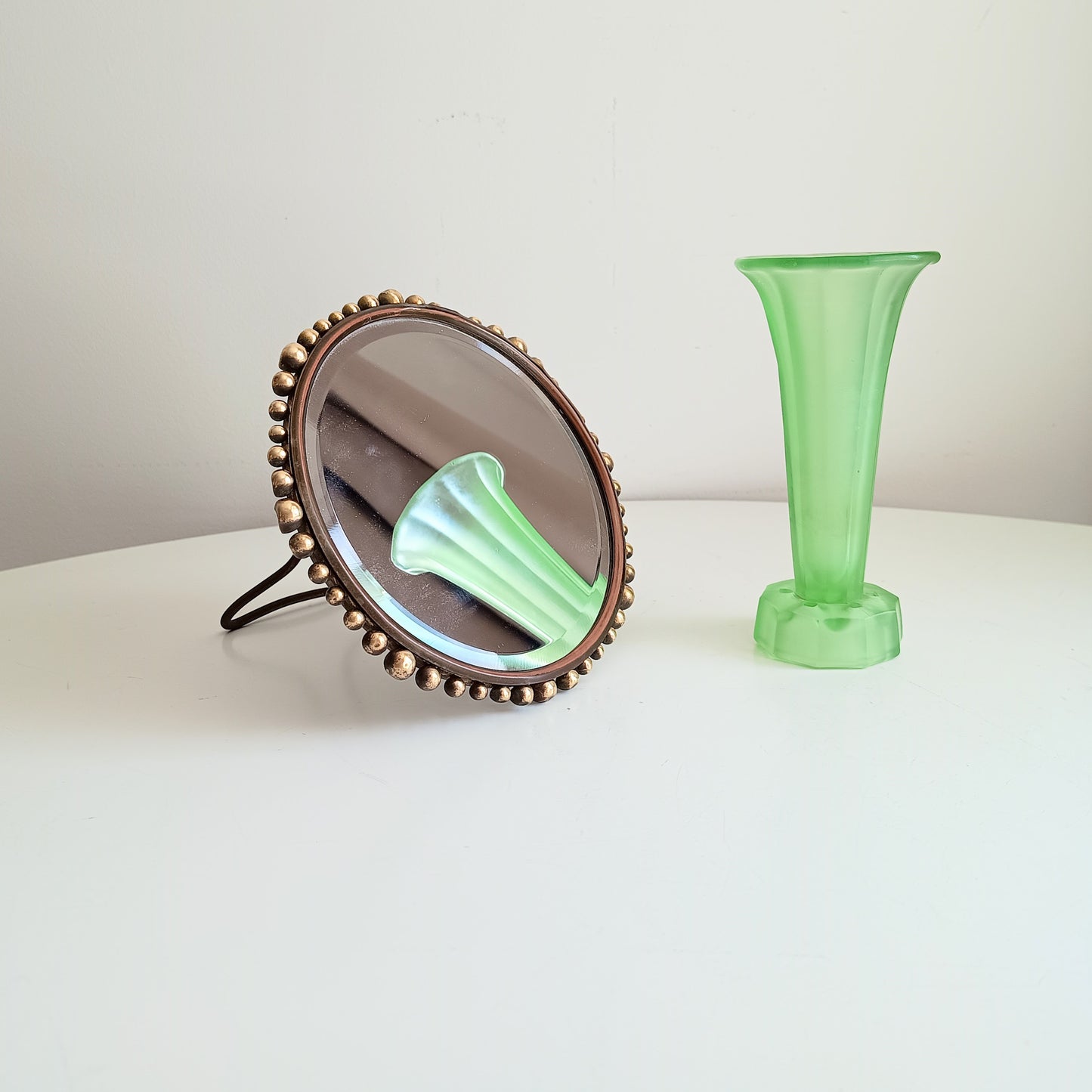 Arts and crafts Round mirror with  hammered bronze decorative frame